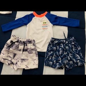 Swim trunks and sun blocker shirt